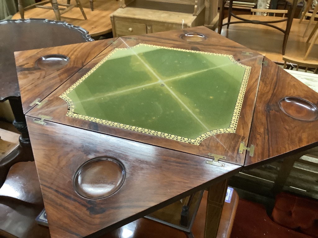 An Edwardian marquetry inlaid rosewood envelope card table, width 55cm, depth 55cm, height 74cm